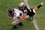 WEST LAFAYETTE, IN - SEPTEMBER 20:  Quarterback Dan LeFevour #13 of the Central Michigan Chippewas is tackled by Ryan Kerrigan #94 of the Purdue Boilermakers at Ross-Ade Stadium on September 20, 2008 in West Lafayette, Indiana.  (Photo by Ronald Martinez/Getty Images)