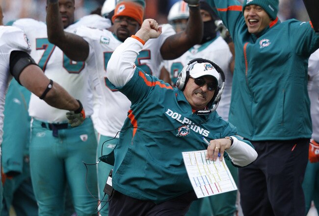NASHVILLE, TN - DECEMBER 20: Head coach Tony Sparano of the Miami Dolphins celebrates after the game tying touchdown against the Tennessee Titans at LP Field on December 20, 2009 in Nashville, Tennessee. The Titans defeated the Dolphins 27-24 in overtime. (Photo by Joe Robbins/Getty Images)