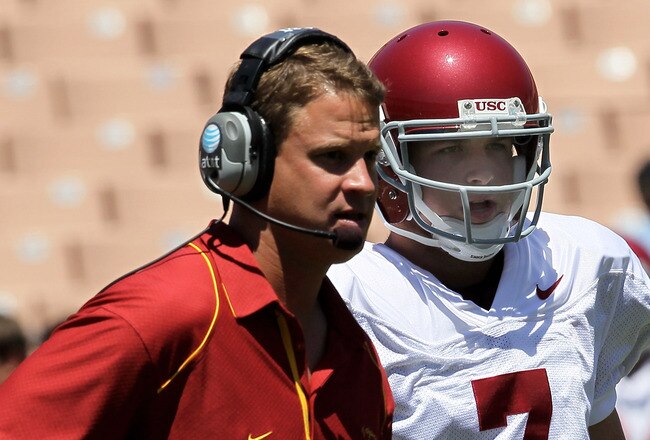 LOS ANGELES, CA - MAY 01:  Head coach Lane Kiffin talks with quarterback Matt Barkley #7 during the  USC Trojans spring game on  May 1, 2010 at the Los Angeles Memorial Coliseum in Los Angeles, California.  (Photo by Stephen Dunn/Getty Images)