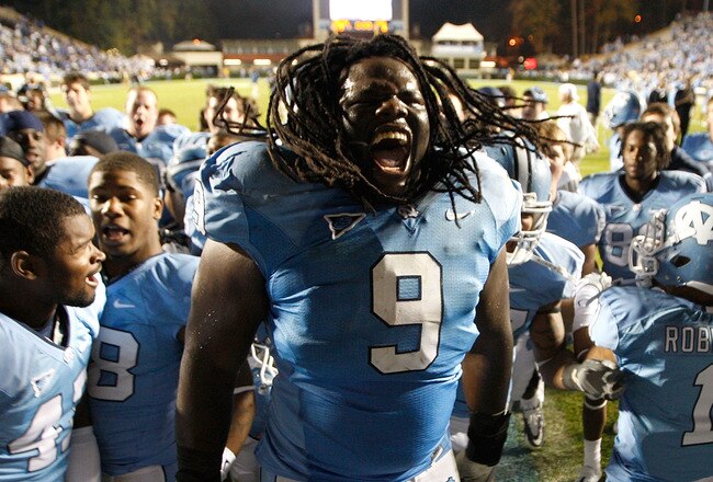 CHAPEL HILL, NC - NOVEMBER 07:  Marvin Austin #9 of the North Carolina Tar Heels celebrates with teammates after a 19-6 victory over the Duke Blue Devils during their game at Kenan Stadium on November 7, 2009 in Chapel Hill, North Carolina.  (Photo by Streeter Lecka/Getty Images)