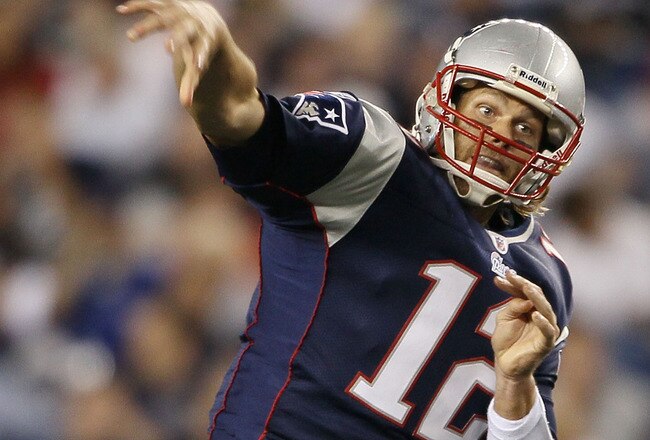 FOXBORO, MA - AUGUST 26: Tom Brady #12 of the New England Patriots throws the ball in the third quarter against the St. Louis Rams on August 26, 2010 at Gillette Stadium in Foxboro, Massachusetts. The Rams defeated the Patriots 36-35.  (Photo by Elsa/Getty Images)