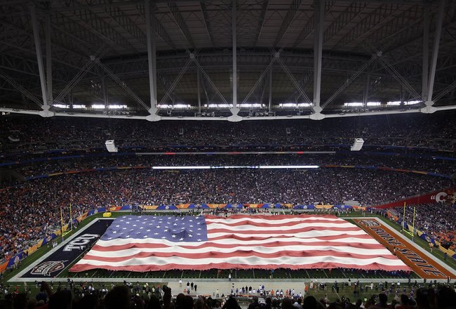 GLENDALE, AZ - JANUARY 04:  A general view of the American flag on the field during the national anthem before the Tostitos Fiesta Bowl between the Boise State Broncos and the TCU Horned Frogs at the Universtity of Phoenix Stadium on January 4, 2010 in Glendale, Arizona.  (Photo by Maxx Wolfson/Getty Images)