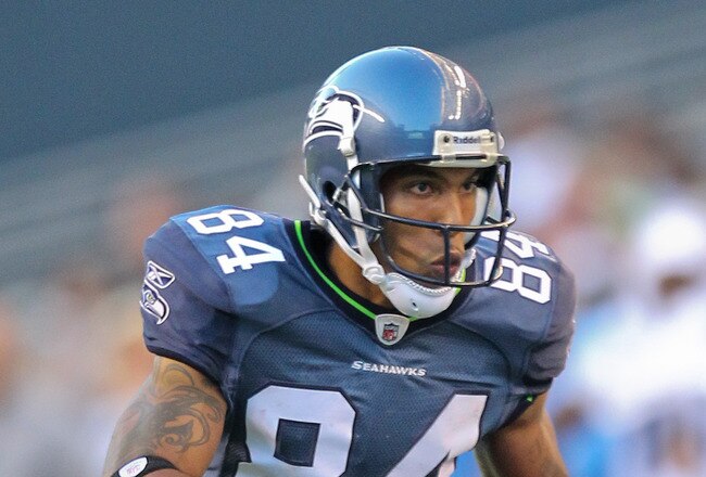 SEATTLE - AUGUST 14:  Wide receiver T.J. Houshmandzadeh #84 of the Seattle Seahawks rushes during the preseason game against  the Tennessee Titans at Qwest Field on August 14, 2010 in Seattle, Washington. (Photo by Otto Greule Jr/Getty Images)