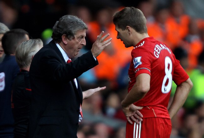LIVERPOOL, ENGLAND - AUGUST 15:  Liverpool Manager Roy Hodgson issues instructions to Steven Gerrard during the Barclays Premier League match between Liverpool and Arsenal at Anfield on August 15, 2010 in Liverpool, England.  (Photo by Clive Brunskill/Getty Images)