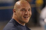 CHICAGO - AUGUST 28: Brian Urlacher #54 of the Chicago Bears smiles as he sits on the bench during a preseason game against the Arizona Cardinals at Soldier Field on August 28, 2010 in Chicago, Illinois. The Cardinals defeated the Bears 14-9. (Photo by Jonathan Daniel/Getty Images)