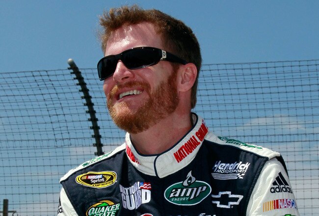 WATKINS GLEN, NY - AUGUST 08:  Dale Earnhardt Jr., driver of the #88 AMP Energy/National Guard Chevrolet, stands on the grid prior to the NASCAR Sprint Cup Series Heluva Good! Sour Cream Dips at Watkins Glen International on August 8, 2010 in Watkins Glen, New York.  (Photo by Kevin C. Cox/Getty Images)