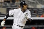 NEW YORK - JULY 20:  Curtis Granderson #14 of the New York Yankees bats against the Los Angeles Angels of Anaheim on July 20, 2010 at Yankee Stadium in the Bronx borough of New York City. The Angels defeated the Yankees 10-2.  (Photo by Jim McIsaac/Getty Images)