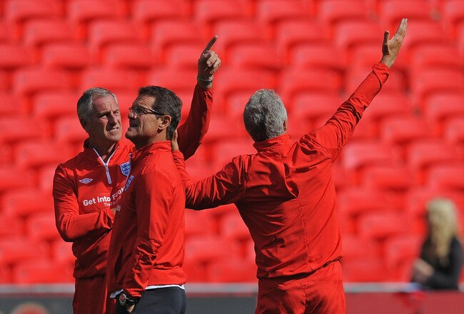 LONDON, ENGLAND - SEPTEMBER 02:  England manager Fabio Capello stands with goalkeeping coaches Ray Clemence and Franco Tancredi during the England training session at Wembley Stadium on September 2, 2010 in London, England.  (Photo by Michael Regan/Getty Images)