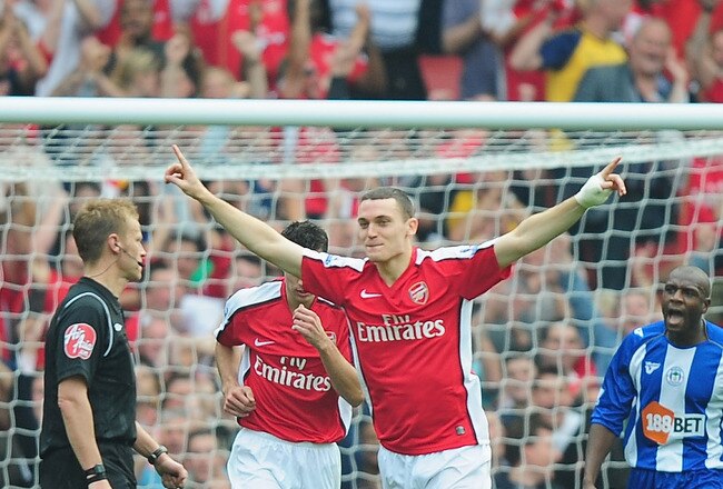LONDON, ENGLAND - SEPTEMBER 19:  Thomas Vermaelen of Arsenal celebrates his second goal during the Barclays Premier League match between Arsenal and Wigan Athletic at the Emirates Stadium on September 19, 2009 in London, England.  (Photo by Clive Mason/Getty Images)