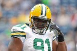 SEATTLE - AUGUST 21:  Defensive end Justin Harrell #91 of the Green Bay Packers looks on during warmups prior to the preseason game against the Seattle Seahawks at Qwest Field on August 21, 2010 in Seattle, Washington. (Photo by Otto Greule Jr/Getty Images)