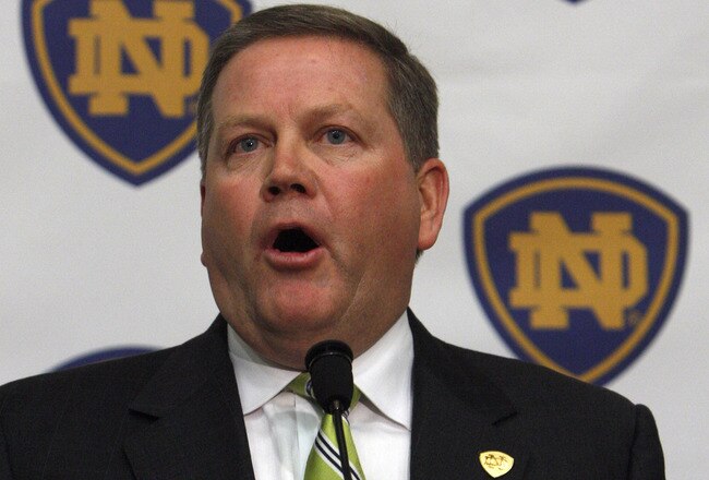 SOUTH BEND, IN - DECEMBER 11: Brian Kelly attends a press conference where he was named new football head coach at Notre Dame University on December 11, 2009 in South Bend, Indiana.  Kelly most recently led the University of Cincinnati to two consecutive Bowl Championship Series appearances including a perfect 12-0 record this past season. (Photo by Frank Polich/Getty Images)