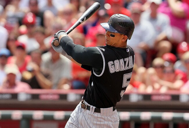 CINCINNATI - JULY 18: Carlos Gonzalez #5 of the Colorado Rockies is at bat during the game against the Cincinnati Reds at Great American Ball Park on July 18, 2010 in Cincinnati, Ohio.  (Photo by Andy Lyons/Getty Images)
