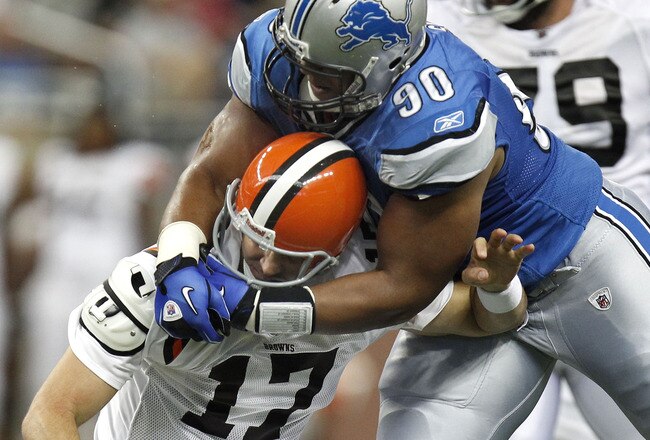 DETROIT - AUGUST 28:  Ndamukong Suh #90 of the Detroit Lions tackles Jake Delhomme #17 of the Cleveland Browns during a preseason game on August 28, 2010 at Ford Field in Detroit, Michigan. Suh was called for a personal foul on the play for grabbing the face mask. (Photo by Gregory Shamus/Getty Images)