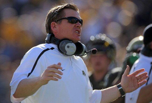 BOULDER, CO - NOVEMBER 07:  Head coach Dan Hawkins leads the Colorado Buffaloes against the Texas A&M Aggies during NCAA college football action at Folsom Field on November 7, 2009 in Boulder, Colorado. Colorado defeated Texas A&M 35-34.  (Photo by Doug Pensinger/Getty Images)