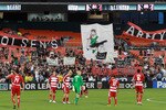 WASHINGTON - AUGUST 14: Fans hold signs in support of head coach Ben Olsen of D.C. United prior to game against FC Dallas at RFK Stadium on August 14, 2010 in Washington, DC. (Photo by Ned Dishman/Getty Images)