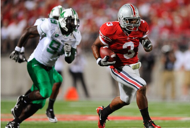 COLUMBUS, OH - SEPTEMBER 2:  Brandon Saine #3 of the Ohio State Buckeyes takes off on a 45-yard touchdown run in the second quarter against the Marshall Thundering Herd at Ohio Stadium on September 2, 2010 in Columbus, Ohio.  (Photo by Jamie Sabau/Getty Images)