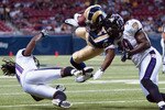 ST. LOUIS - SEPTEMBER 2: Kenneth Darby #34 of the St. Louis Rams is tackled by Travis Fisher #41 and Dannell Ellerbe #59 of the Baltimore Ravens during an NFL preseason game at the Edward Jones Dome on September 2, 2010 in St. Louis, Missouri.  (Photo by Dilip Vishwanat/Getty Images)