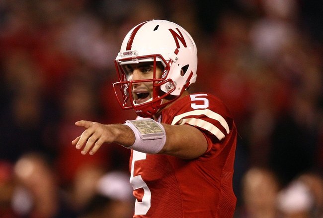 SAN DIEGO - DECEMBER 30:  Quarterback Zac Lee #5 of the University of Nebraska Cornhuskers looks at the defensive formation priro to the snap of the ball during the Pacific Life Holiday Bowl against the University of Arizona Wildcats on December 30, 2009 at Qualcomm Stadium in San Diego, California. The Cornhuskers defeated the Wildcats 33-0. (Photo By Donald Miralle/Getty Images)