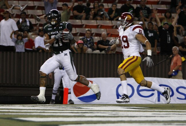 HONOLULU - SEPTEMBER 2:  Kealoha Pilares of the University of Hawaii Warriors  scores a touchdown during secondhalf action at Aloha Stadium September 2, 2010 in Honolulu, Hawaii. (Photo by Kent Nishimura/Getty Images)