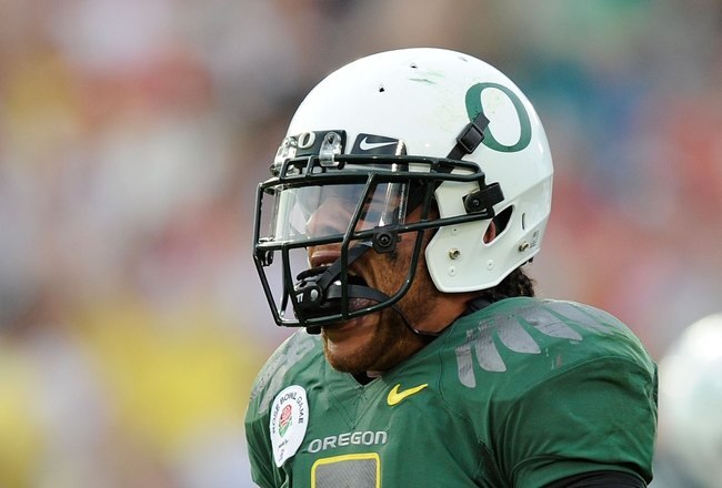 PASADENA, CA - JANUARY 01:  Quarterback Jeremiah Masoli #8 of the Oregon Ducks celebrates after scoring a touchdown against the Ohio State Buckeyes in the 96th Rose Bowl game on January 1, 2010 in Pasadena, California.  (Photo by Kevork Djansezian/Getty Images)