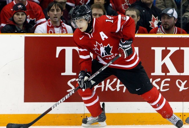 SASKATOON, SK - JANUARY 5:  Jordan Eberle #14 of Team Canada skates with the puck during the 2010 IIHF World Junior Championship Tournament Gold Medal game against Team USA on January 5, 2010 at the Credit Union Centre in Saskatoon, Saskatchewan, Canada.  Team USA defeated Team Canada 6-5 in overtime.(Photo by Richard Wolowicz/Getty Images)