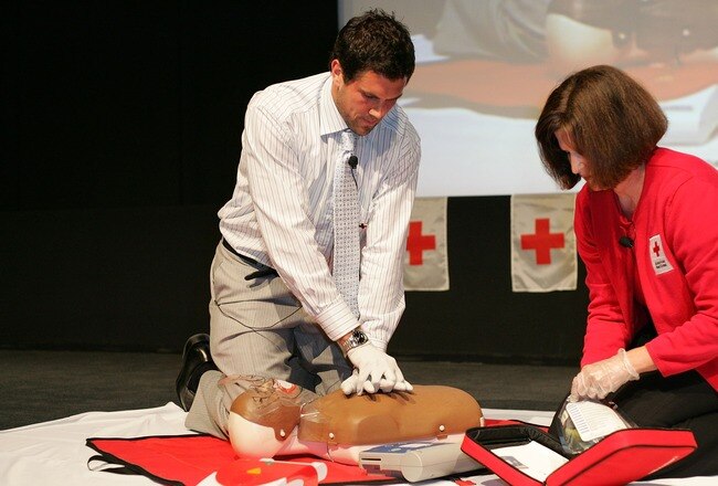 LOS ANGELES, CA - MARCH 10:  Professional quarterback Matt Leinart of the Arizona Cardinals demonstrates CPR at the 7th Annual American Red Cross Celebrity Cabinet press conference at the Pacific Design Center on March 10, 2008 in Los Angeles, California.  (Photo by Neilson Barnard/Getty Images)