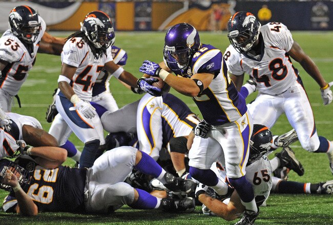 MINNEAPOLIS - SEPTEMBER 02:  Ian Johnson #42 of the Minnesota Vikings scores a touchdown during an NFL preseason game against the Denver Broncos at the Mall of America Field at Hubert H. Humphrey Metrodome, on September 2, 2010 in Minneapolis, Minnesota.  (Photo by Tom Dahlin/Getty Images)