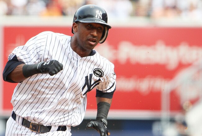 NEW YORK - AUGUST 21:  Curtis Granderson #14 of the New York Yankees runs against the Seattle Mariners in the seventh inning at Yankee Stadium on August 21, 2010 in the Bronx borough of New York City. The Yankees won 9-5.  (Photo by Andrew Burton/Getty Images)