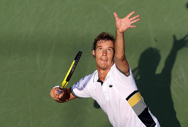NEW YORK - SEPTEMBER 02:  Richard Gasquet of France serves to Nikolay Davydenko of Russia during the Men's singles on day four of the 2010 U.S. Open at the USTA Billie Jean King National Tennis Center on September 2, 2010 in the Flushing neighborhood of the Queens borough of New York City.  (Photo by Matthew Stockman/Getty Images)