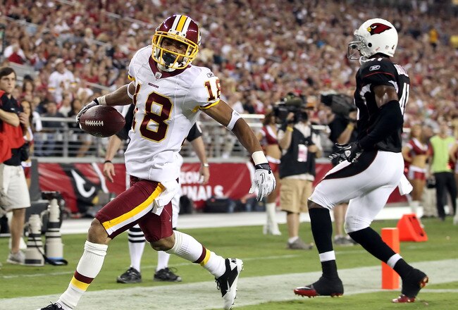 GLENDALE, AZ - SEPTEMBER 02:  Wide receiver Terrence Austin #18 of the Washington Redskins scores a 21 yard touchdown reception against the Arizona Cardinals during the fourth quarter of the preseason NFL game at the University of Phoenix Stadium on September 2, 2010 in Glendale, Arizona. The Cardinals defeated the Redskins 20-10.  (Photo by Christian Petersen/Getty Images)