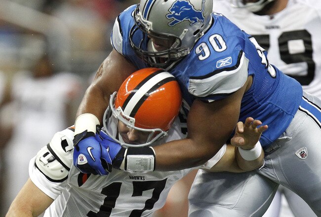 DETROIT - AUGUST 28:  Ndamukong Suh #90 of the Detroit Lions tackles Jake Delhomme #17 of the Cleveland Browns during a preseason game on August 28, 2010 at Ford Field in Detroit, Michigan. Suh was called for a personal foul on the play for grabbing the face mask. (Photo by Gregory Shamus/Getty Images)