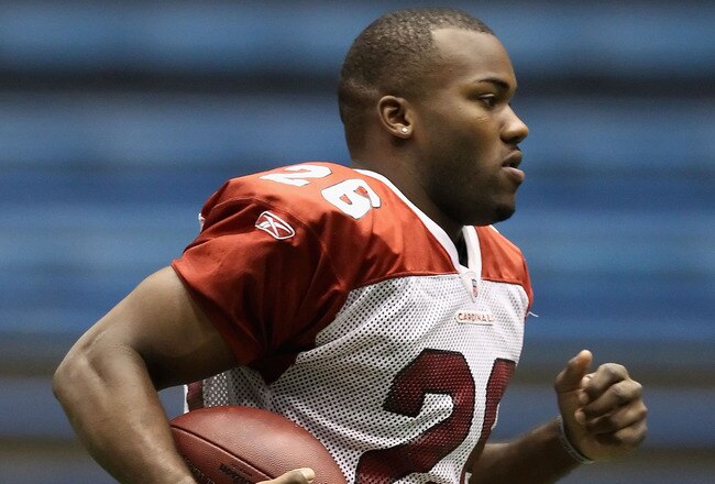 FLAGSTAFF, AZ - AUGUST 02:  Runningback Beanie Wells #26 of the Arizona Cardinals practices in the team training camp at Northern Arizona University Walkup Skydome on August 2, 2010 in Flagstaff, Arizona.  (Photo by Christian Petersen/Getty Images)