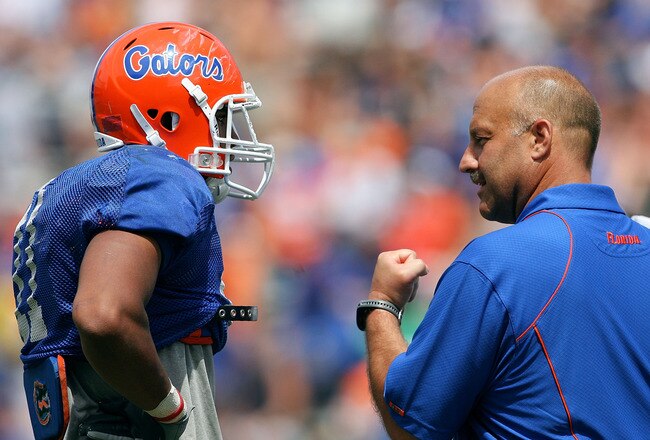 GAINESVILLE, FL - APRIL 10:  Offensive coordinator Steve Addazio, R, and quarterback Jordan Reed #11 of the Florida Gators celebrate Reed's game-winning touchdown pass during the Orange & Blue game at Ben Hill Griffin Stadium on April 10, 2010 in Gainesville, Florida.  (Photo by Doug Benc/Getty Images)