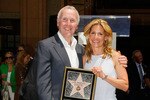 HOLLYWOOD - JUNE 20:  Team owner Frank McCourt (L) and wife Jamie attend a special star ceremony honoring the Los Angeles Dodgers with an Award of Excellence on the Hollywood Walk of Fame on June 20, 2008 in Hollywood, California.  (Photo by Vince Bucci/Getty Images)