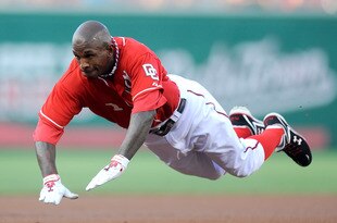 WASHINGTON - JULY 30:  Nyjer Morgan #1 of the Washington Nationals slides into third base with a triple in the first inning against the Philadelphia Phillies at Nationals Park on July 30, 2010 in Washington, DC.  (Photo by Greg Fiume/Getty Images)