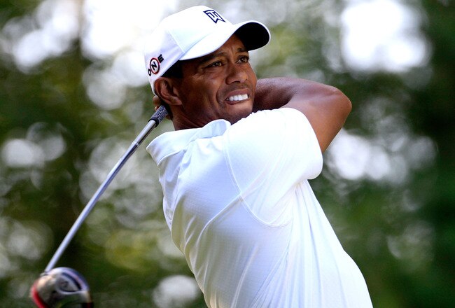 NORTON, MA - SEPTEMBER 04:  Tiger Woods tees off at the ninth hole during the second round of the Deutsche Bank Championship at TPC Boston on September 4, 2010 in Norton, Massachusetts.  (Photo by Michael Cohen/Getty Images)