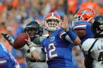GAINESVILLE, FL - NOVEMBER 21: Quarterback John Brantley #12 of the Florida Gators sets to pass against the Florida International University Golden Panthers, November 21, 2009 at Ben Hill Griffin Stadium in Gainesville, Florida.  (Photo by Al Messerschmidt/Getty Images)