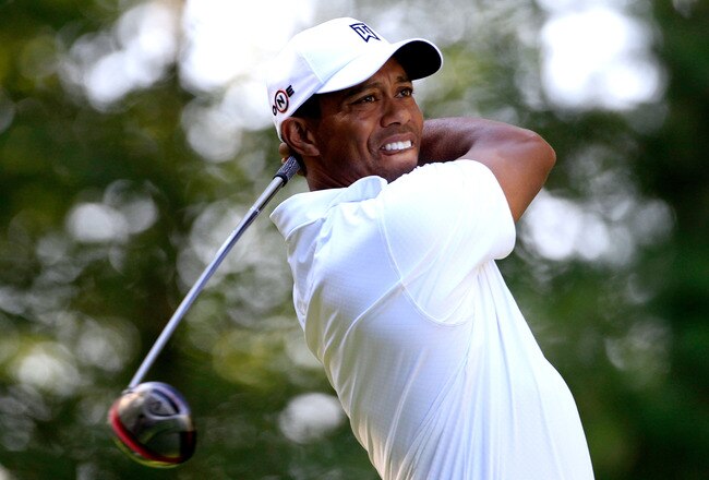 NORTON, MA - SEPTEMBER 04:  Tiger Woods tees off at the ninth hole during the second round of the Deutsche Bank Championship at TPC Boston on September 4, 2010 in Norton, Massachusetts.  (Photo by Michael Cohen/Getty Images)