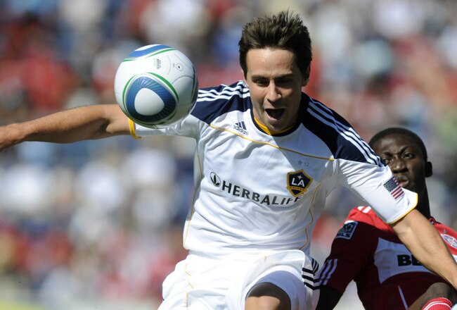 BRIDGEVIEW, IL - SEPTEMBER 4: Patrick Nyarko #10 of the Chicago Fire and Todd Dunivant #2 of the Los Angeles Galaxy  go for the ball in an MLS match on September 4, 2010 at Toyota Park in Bridgeview, Illinois. (Photo by David Banks/Getty Images)