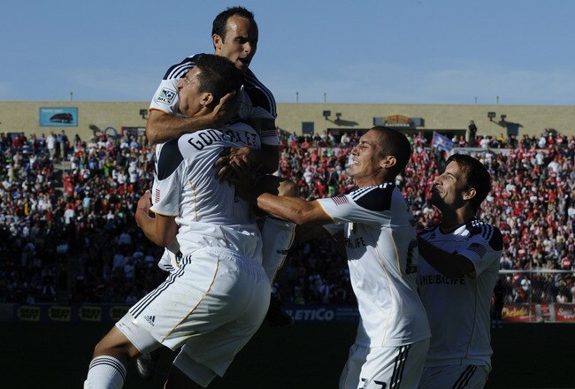 BRIDGEVIEW, IL - SEPTEMBER 4: Omar Gonzalez #4 of the Los Angeles Galaxy celebrates his goal with Landon Donovan #10 against the Chicago Fire in an MLS match on September 4, 2010 at Toyota Park in Bridgeview, Illinois. The match ended in a 1-1 draw. (Photo by David Banks/Getty Images)