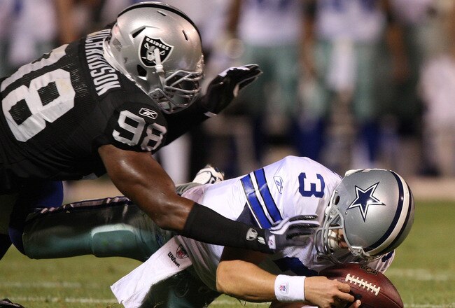 OAKLAND, CA - AUGUST 13: Defensive end Jay Richardson #98 of the Oakland Raiders sacks quarterback Jon Kitna #3 of the Dallas Cowboys after a bad snap during the preseason game at Oakland-Alameda County Coliseum on August 13, 2009 in Oakland, California. (Photo by Jed Jacobsohn/Getty Images)