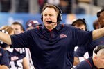 ARLINGTON, TX - JANUARY 02:  Head coach Houston Nutt of the Mississippi Rebels during the AT&T Cotton Bowl on January 2, 2010 at Cowboys Stadium in Arlington, Texas.  (Photo by Ronald Martinez/Getty Images)