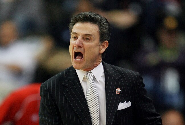 JACKSONVILLE, FL - MARCH 19:  Rick Pitino head coach of the Louisville Cardinals yells out to his team while facing the California Golden Bears during the first round of the 2010 NCAA men's basketball tournament at Jacksonville Veteran's Memorial Arena on March 19, 2010 in Jacksonville, Florida.  (Photo by Doug Benc/Getty Images)