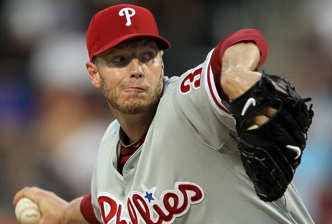 NEW YORK - AUGUST 14:  Roy Halladay #34 of the Philadelphia Phillies delivers a pitch against the New York Mets on August 14, 2010 at Citi Field in the Flushing neighborhood of the Queens borough of New York City.  (Photo by Jim McIsaac/Getty Images)