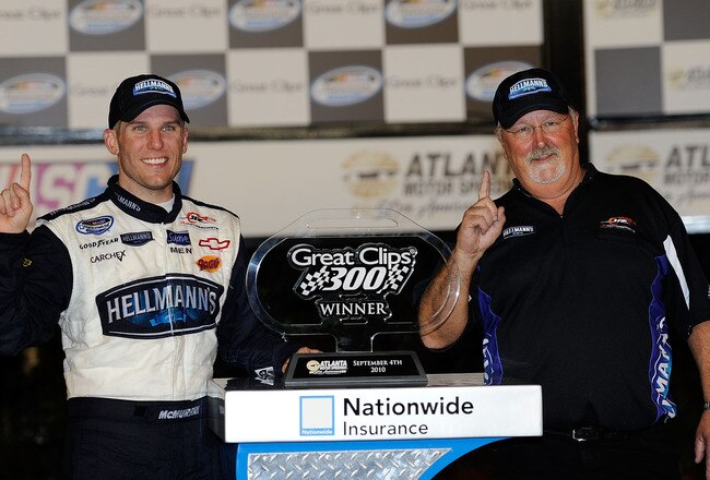 HAMPTON, GA - SEPTEMBER 04:  Jamie McMurray (L), driver of the #88 Hellman's/BJ's Chevrolet, and crew chief Tony Eury Sr. pose in Victory Lane after winning the NASCAR Nationwide Series Great Clips 300 at Atlanta Motor Speedway on September 4, 2010 in Hampton, Georgia.  (Photo by John Harrelson/Getty Images for NASCAR)