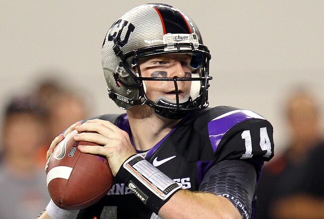 ARLINGTON, TX - SEPTEMBER 04:  Quarterback Andy Dalton #14 of the TCU Horned Frogs drops back to pass against the Oregon State Beavers at Cowboys Stadium on September 4, 2010 in Arlington, Texas.  (Photo by Ronald Martinez/Getty Images)