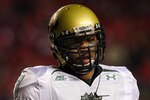 PISCATAWAY, NJ - NOVEMBER 12:  B.J. Daniels #7 of the South Florida Bulls looks on against the Rutgers Scarlet Knights at Rutgers Stadium on November 12, 2009 in Piscataway, New Jersey.  (Photo by Jim McIsaac/Getty Images)
