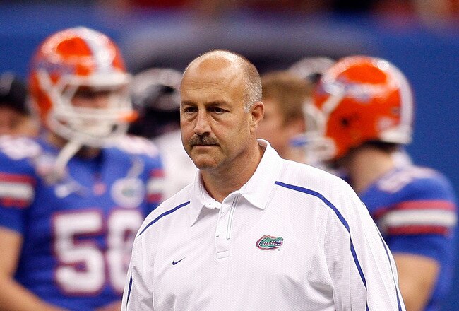 NEW ORLEANS - JANUARY 01:  Offensive coordinator and interim head coach Steve Addazio (C) of the Florida Gators stands on the field before the Allstate Sugar Bowl against the Cincinnati Bearcats at the Louisana Superdome on January 1, 2010 in New Orleans, Louisiana.  (Photo by Chris Graythen/Getty Images)