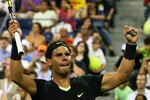NEW YORK - SEPTEMBER 03:  Rafael Nadal of Spain celebrates defeating Denis Istomin of Uzbekistan (not pictured) during day five of the 2010 U.S. Open at the USTA Billie Jean King National Tennis Center on September 3, 2010 in the Flushing neighborhood of the Queens borough of New York City.  (Photo by Andrew Burton/Getty Images)