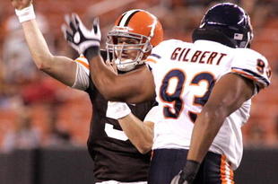 CLEVELAND - SEPTEMBER 2:  Brett Ratliff #5 of the Cleveland Browns passes through pressure from Jarron Gilbert #93 of the Chicago Bears during the preseason game on September 2, 2010 at Cleveland Browns Stadium in Cleveland, Ohio. The Browns defeated the Bears 13-10.  (Photo by Justin K. Aller/Getty Images)